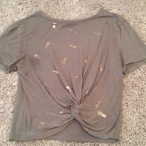 Green t shirt with pineapples